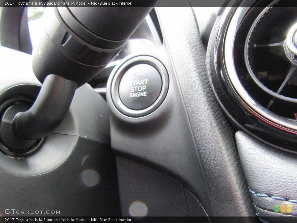 Mid-Blue Black Interior Controls for the 2017 Toyota Yaris iA  #116491023