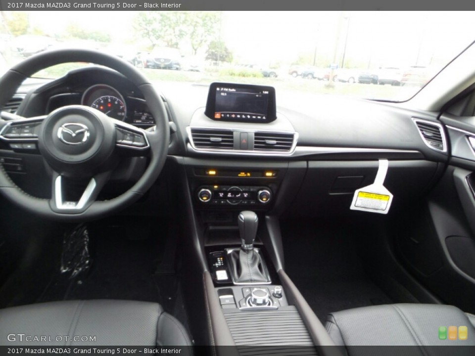 Black Interior Dashboard for the 2017 Mazda MAZDA3 Grand Touring 5 Door #116496024