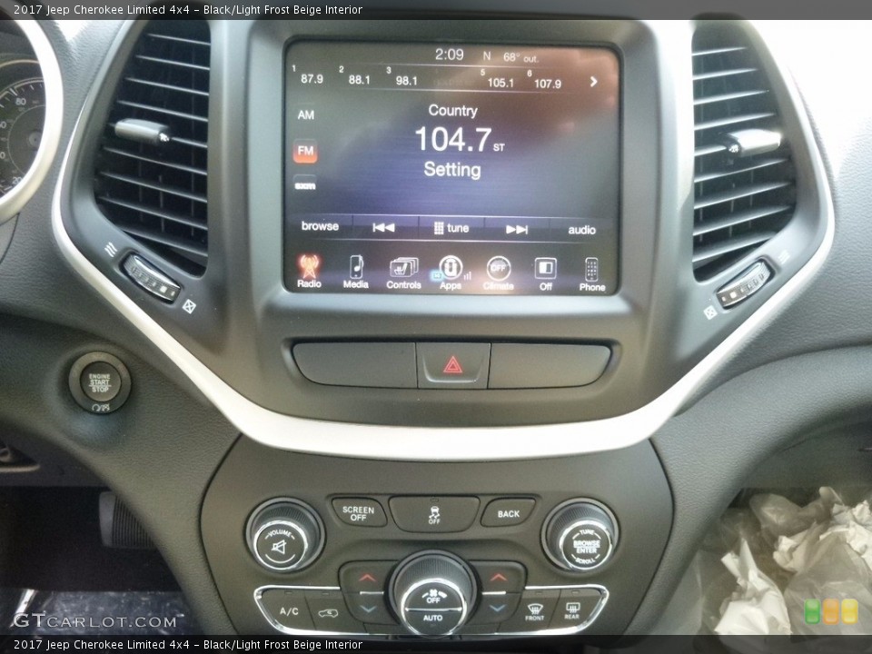 Black/Light Frost Beige Interior Controls for the 2017 Jeep Cherokee Limited 4x4 #116528403