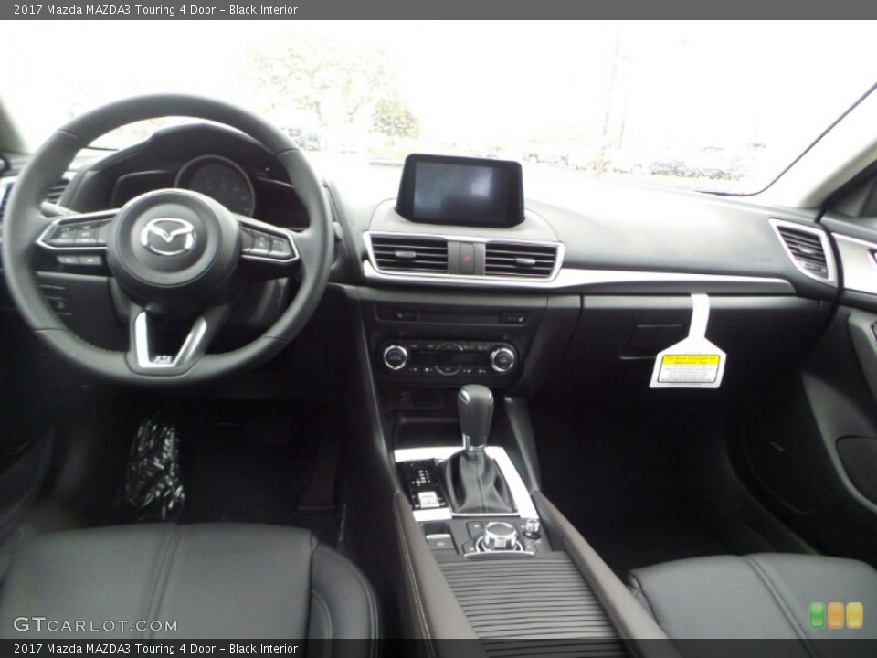 Black Interior Dashboard for the 2017 Mazda MAZDA3 Touring 4 Door #116531328