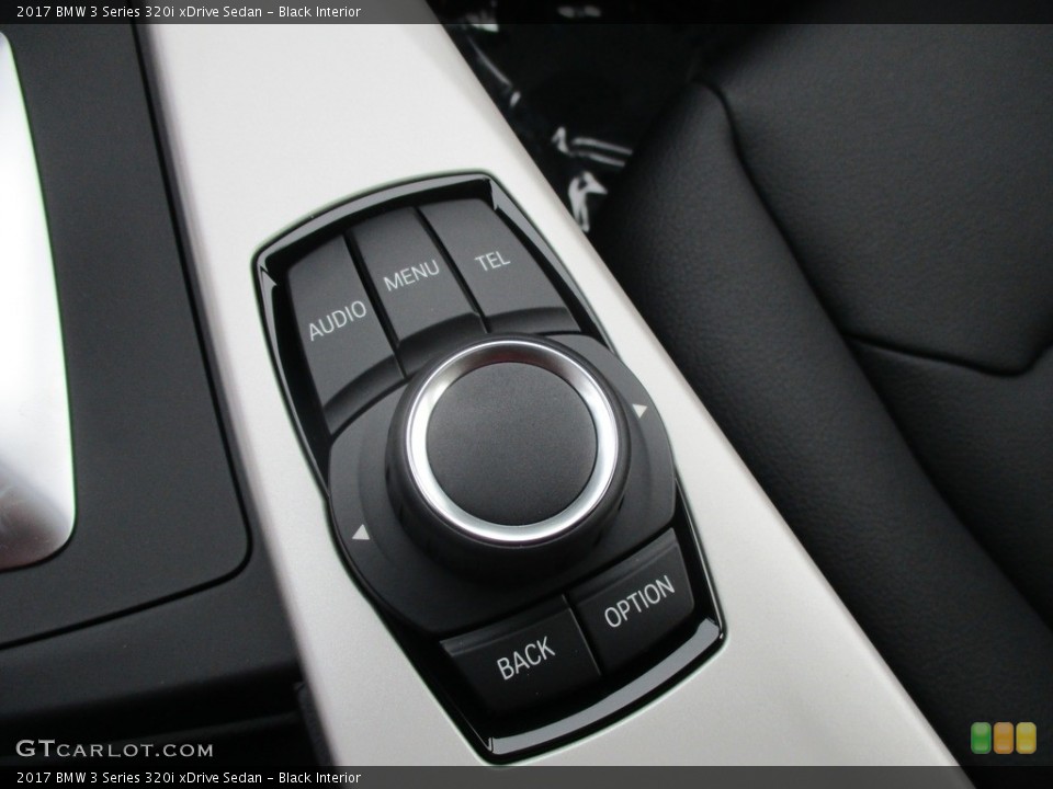 Black Interior Controls for the 2017 BMW 3 Series 320i xDrive Sedan #116615363