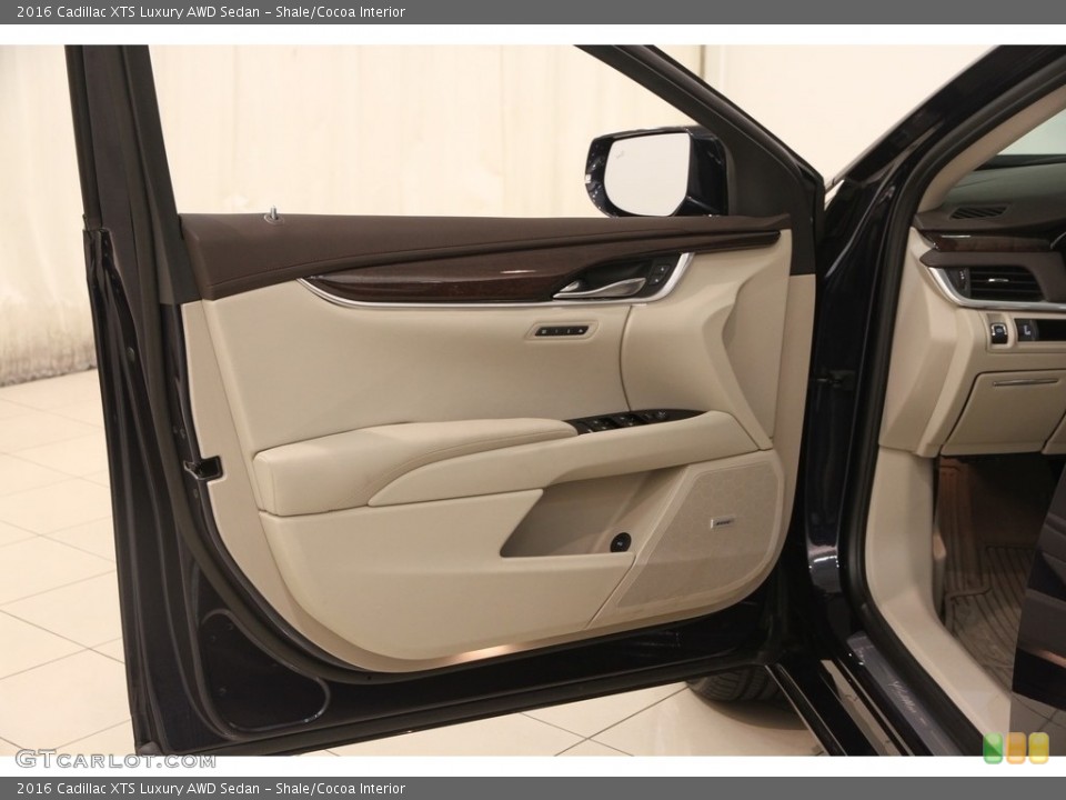 Shale/Cocoa Interior Door Panel for the 2016 Cadillac XTS Luxury AWD Sedan #116679264