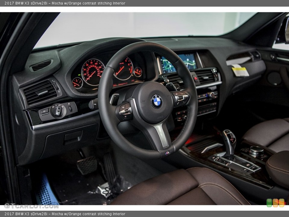 Mocha w/Orange contrast stitching Interior Front Seat for the 2017 BMW X3 sDrive28i #116698080