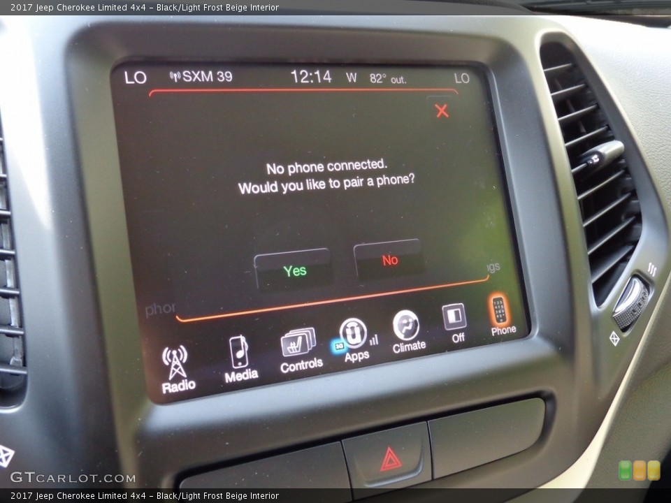 Black/Light Frost Beige Interior Controls for the 2017 Jeep Cherokee Limited 4x4 #116735971