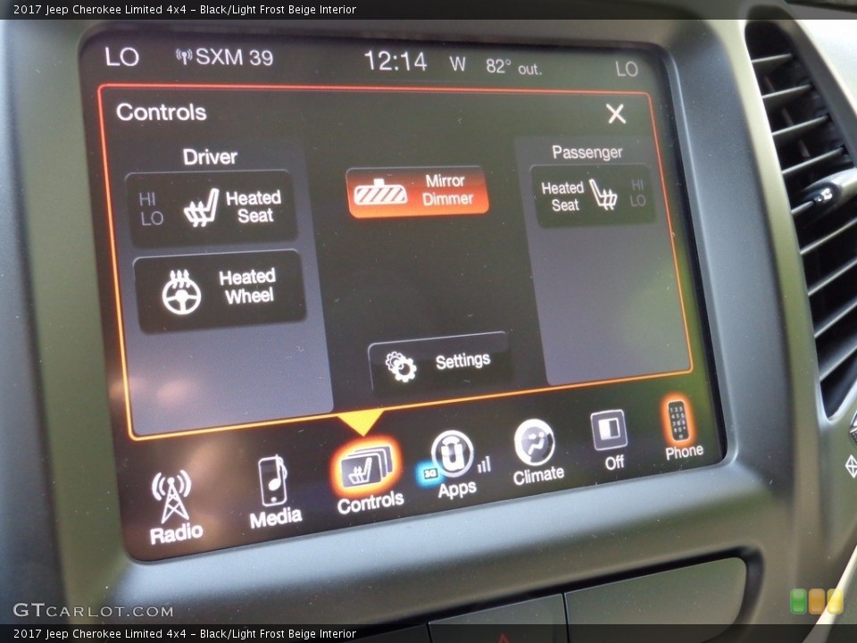Black/Light Frost Beige Interior Controls for the 2017 Jeep Cherokee Limited 4x4 #116735998