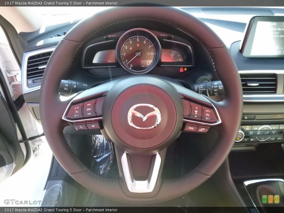 Parchment Interior Steering Wheel for the 2017 Mazda MAZDA3 Grand Touring 5 Door #116923422