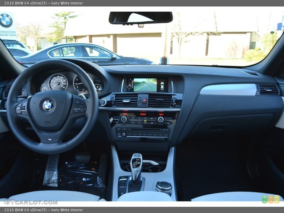 Ivory White Interior Dashboard for the 2016 BMW X4 xDrive35i #116953285