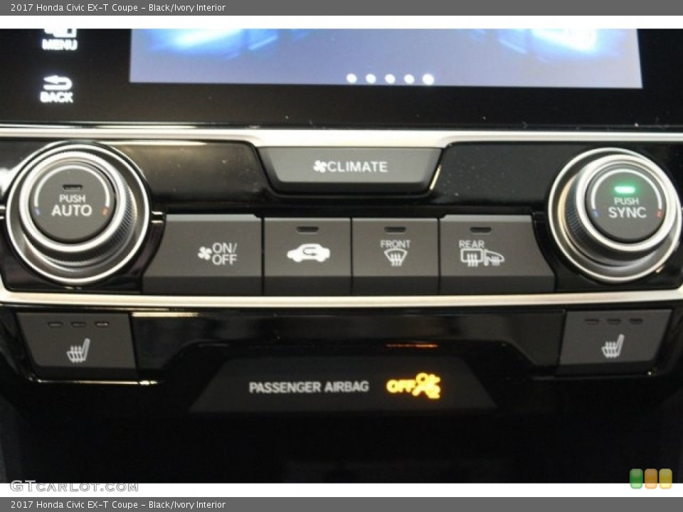 Black/Ivory Interior Controls for the 2017 Honda Civic EX-T Coupe #117055763