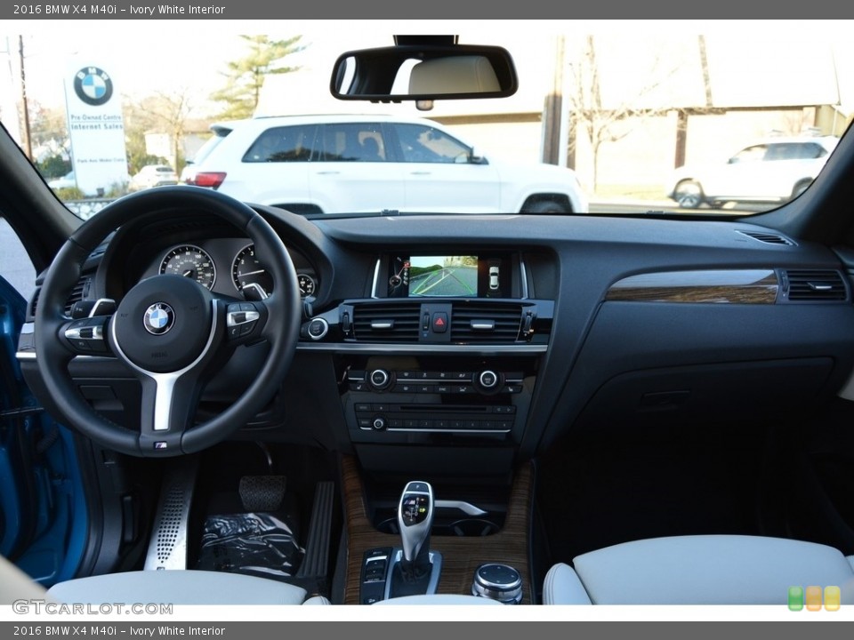Ivory White Interior Dashboard for the 2016 BMW X4 M40i #117067737