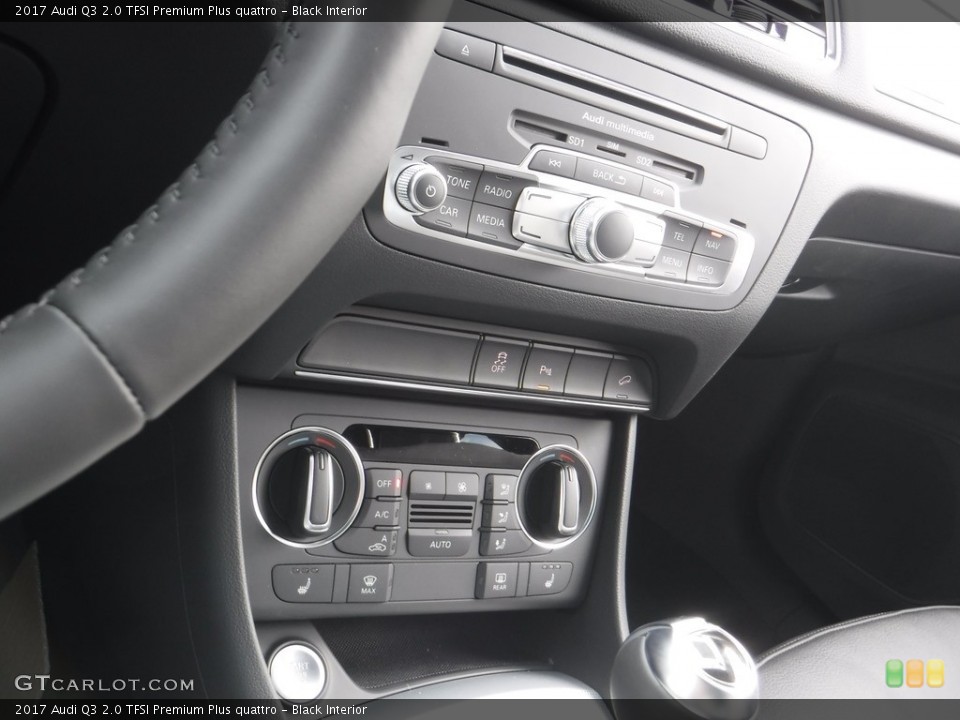 Black Interior Controls for the 2017 Audi Q3 2.0 TFSI Premium Plus quattro #117075048