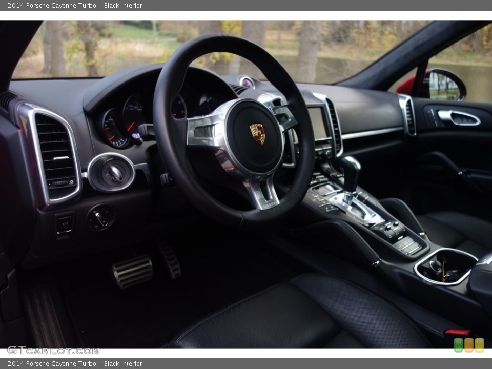 Black Interior Dashboard for the 2014 Porsche Cayenne Turbo #117147410