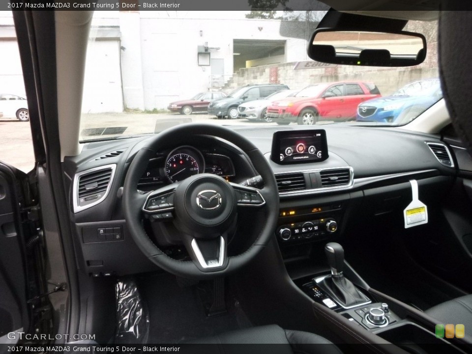 Black Interior Dashboard for the 2017 Mazda MAZDA3 Grand Touring 5 Door #117435159