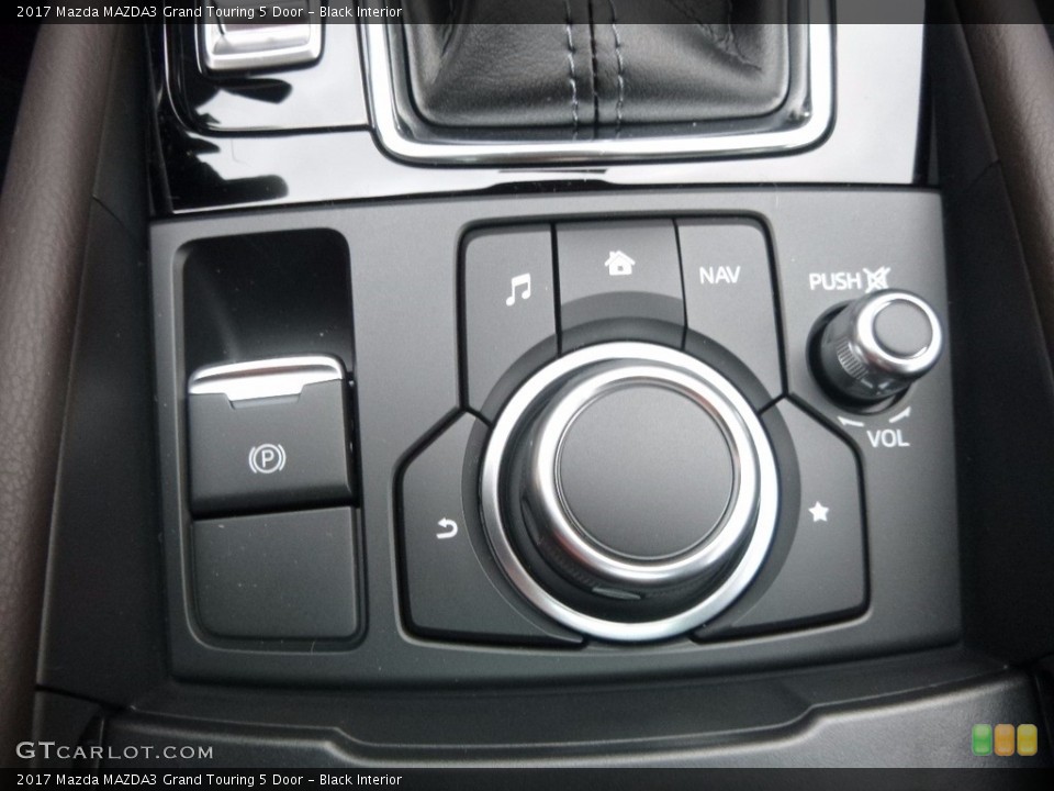Black Interior Controls for the 2017 Mazda MAZDA3 Grand Touring 5 Door #117435333