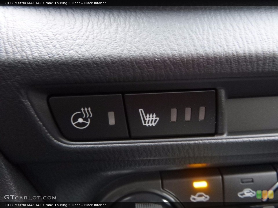 Black Interior Controls for the 2017 Mazda MAZDA3 Grand Touring 5 Door #117435366