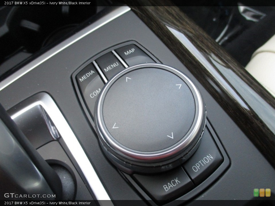 Ivory White/Black Interior Controls for the 2017 BMW X5 xDrive35i #117511879