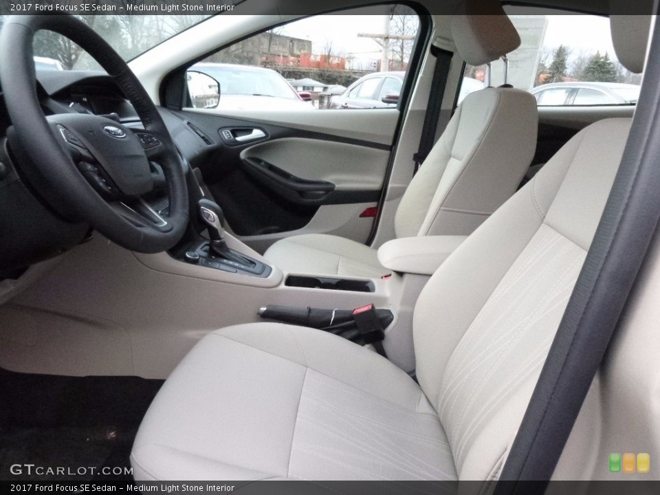 Medium Light Stone Interior Front Seat for the 2017 Ford Focus SE Sedan #117516229