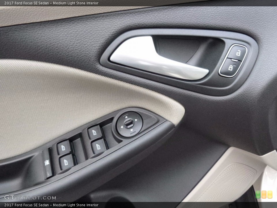 Medium Light Stone Interior Controls for the 2017 Ford Focus SE Sedan #117516316