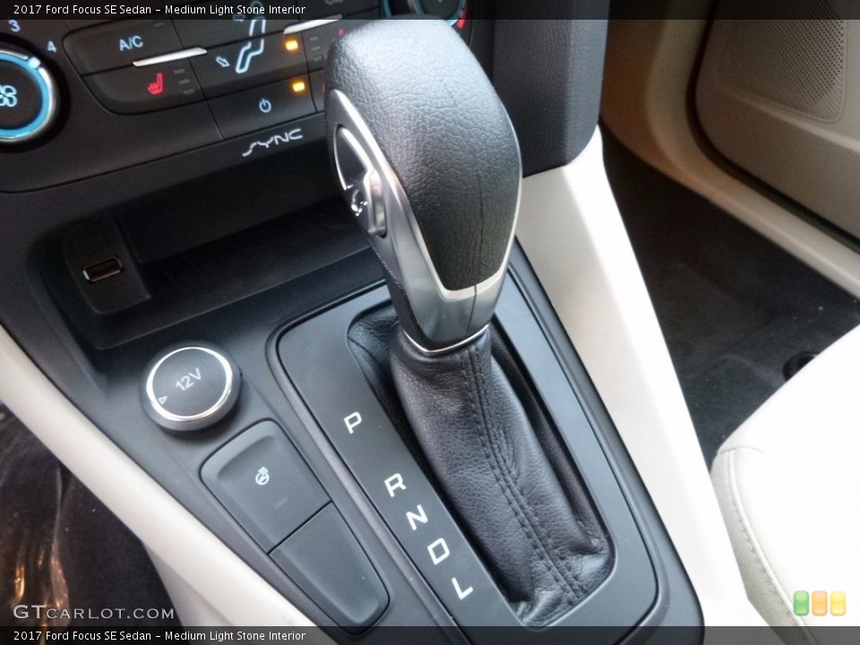 Medium Light Stone Interior Transmission for the 2017 Ford Focus SE Sedan #117516394