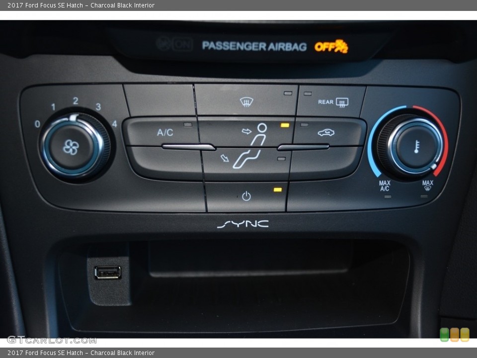 Charcoal Black Interior Controls for the 2017 Ford Focus SE Hatch #117527428