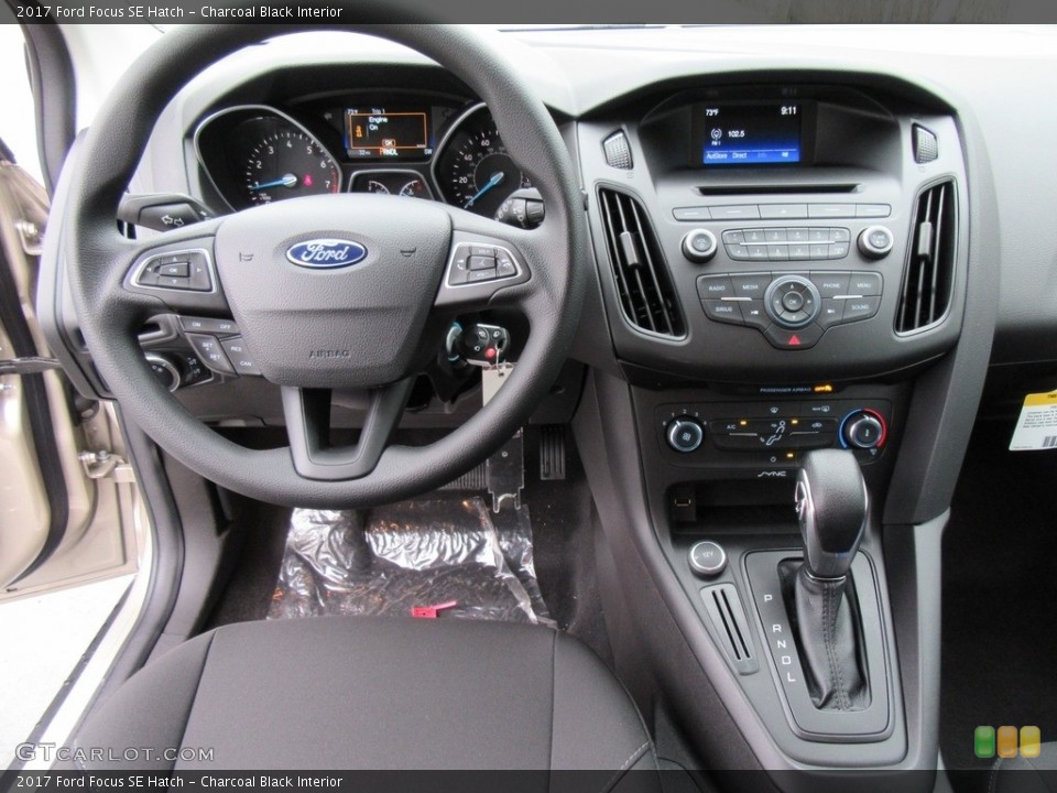 Charcoal Black Interior Dashboard for the 2017 Ford Focus SE Hatch #117546722