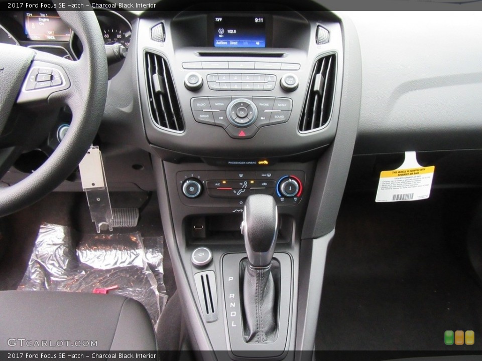 Charcoal Black Interior Controls for the 2017 Ford Focus SE Hatch #117546737