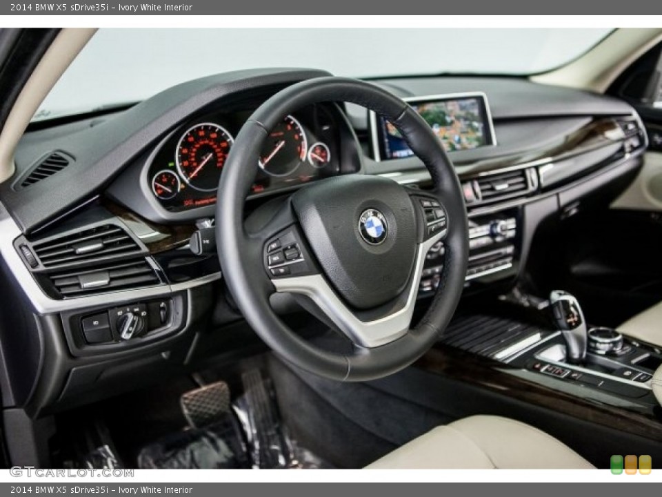 Ivory White Interior Dashboard for the 2014 BMW X5 sDrive35i #117610017