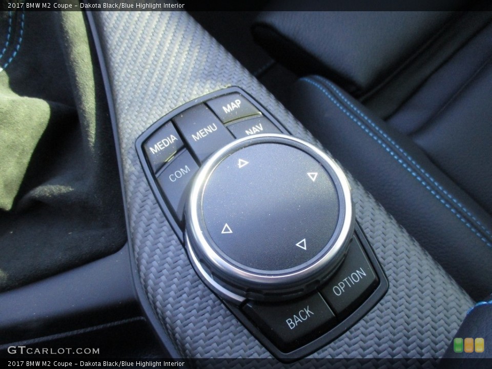 Dakota Black/Blue Highlight Interior Controls for the 2017 BMW M2 Coupe #117655714