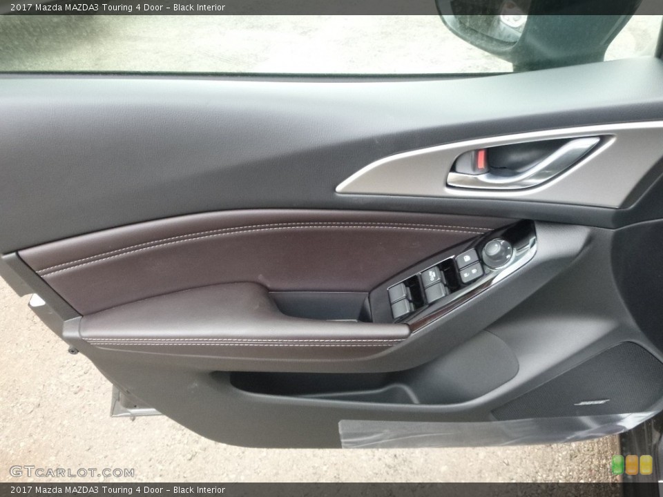 Black Interior Door Panel for the 2017 Mazda MAZDA3 Touring 4 Door #117765779