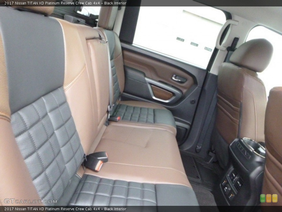Black Interior Rear Seat for the 2017 Nissan TITAN XD Platinum Reserve Crew Cab 4x4 #118105401