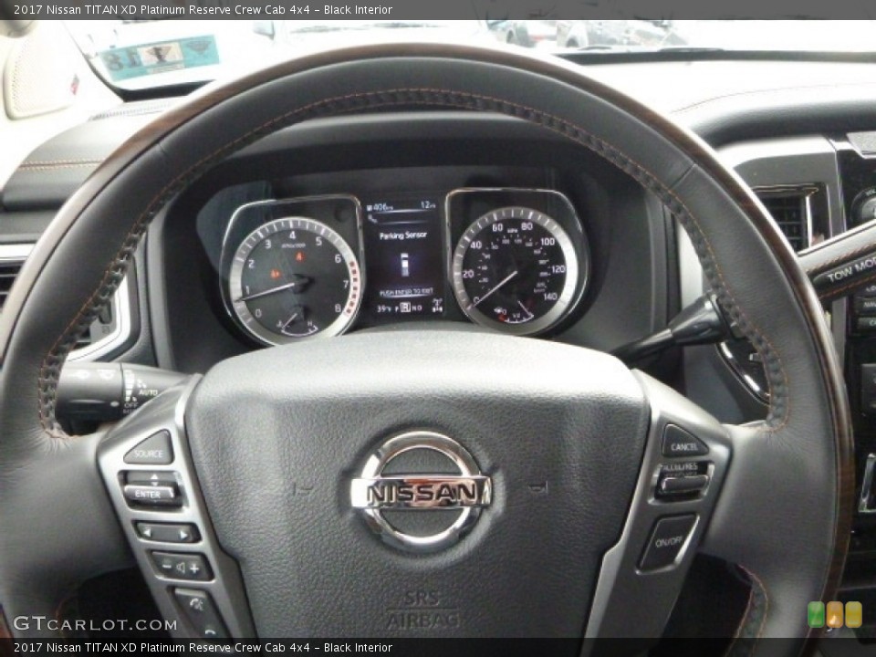 Black Interior Steering Wheel for the 2017 Nissan TITAN XD Platinum Reserve Crew Cab 4x4 #118105716