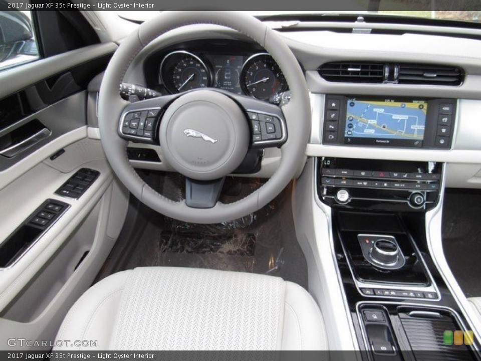 Light Oyster Interior Navigation for the 2017 Jaguar XF 35t Prestige #118160532