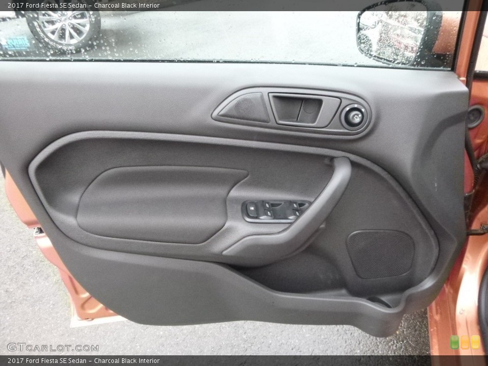 Charcoal Black Interior Door Panel for the 2017 Ford Fiesta SE Sedan #118191428