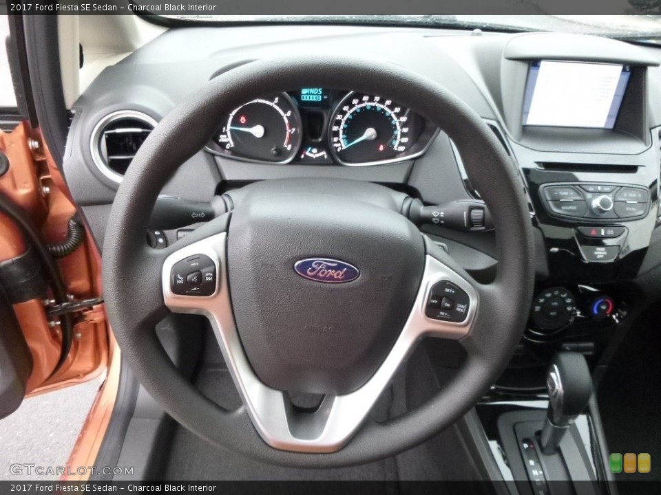 Charcoal Black Interior Steering Wheel for the 2017 Ford Fiesta SE Sedan #118191521