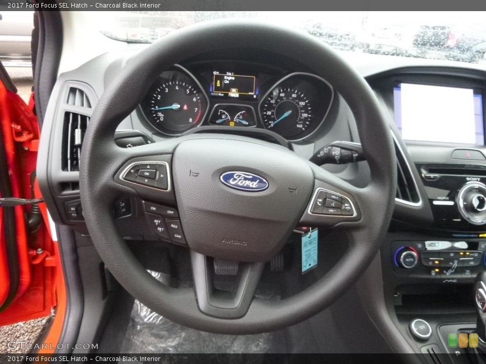 Charcoal Black Interior Steering Wheel for the 2017 Ford Focus SEL Hatch #118231223