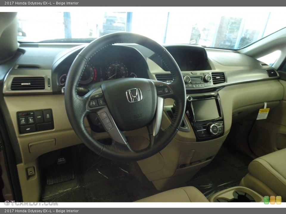 Beige Interior Dashboard for the 2017 Honda Odyssey EX-L #118252704