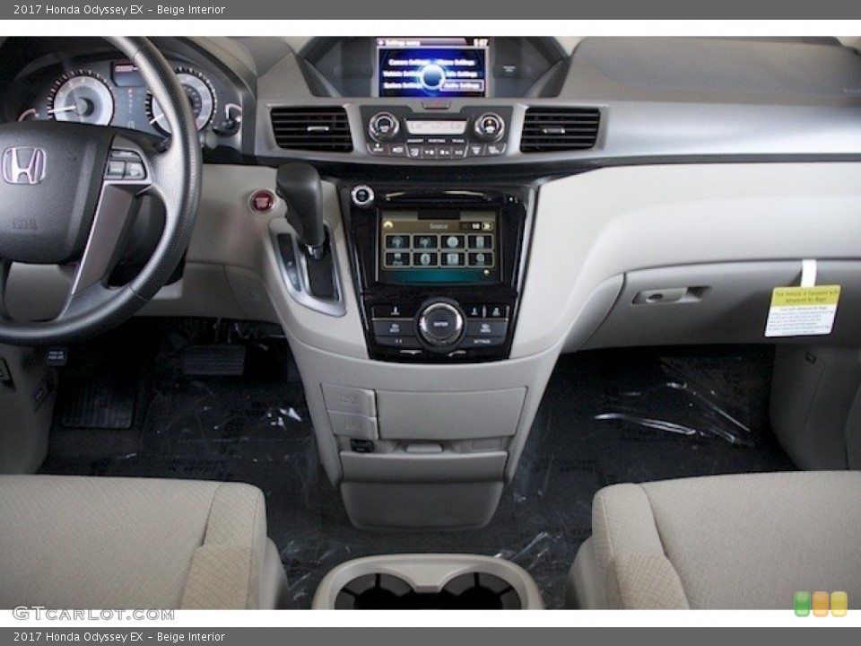 Beige Interior Dashboard for the 2017 Honda Odyssey EX #118303380