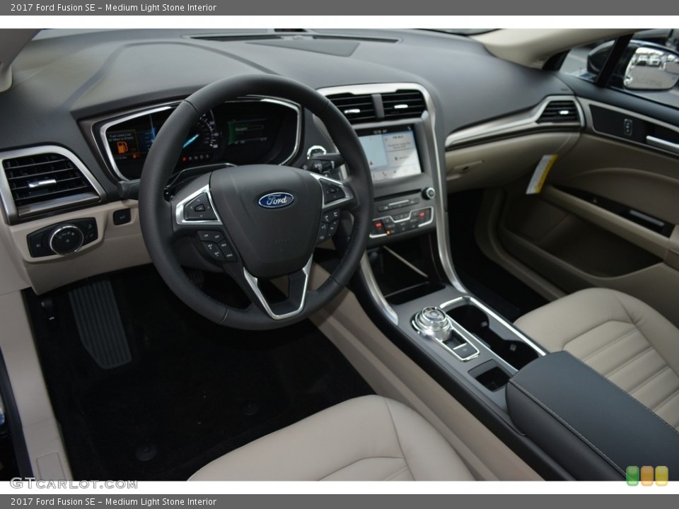 Medium Light Stone Interior Dashboard for the 2017 Ford Fusion SE #118371458