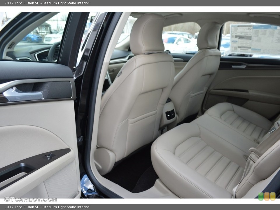 Medium Light Stone Interior Rear Seat for the 2017 Ford Fusion SE #118371486