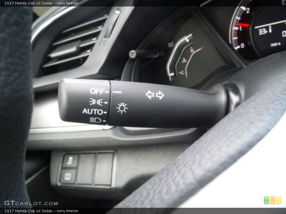 Ivory Interior Controls for the 2017 Honda Civic LX Sedan #118505046