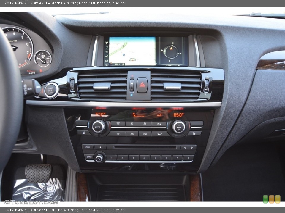 Mocha w/Orange contrast stitching Interior Controls for the 2017 BMW X3 xDrive35i #118531567
