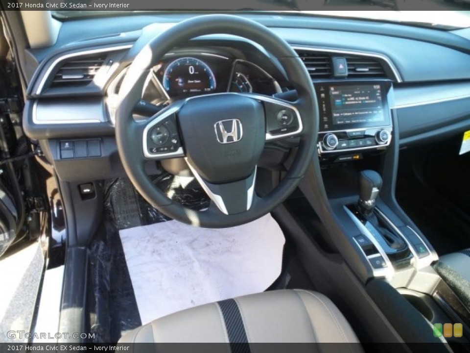 Ivory Interior Dashboard for the 2017 Honda Civic EX Sedan #118561143