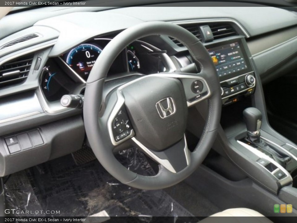 Ivory Interior Steering Wheel for the 2017 Honda Civic EX-L Sedan #118625252