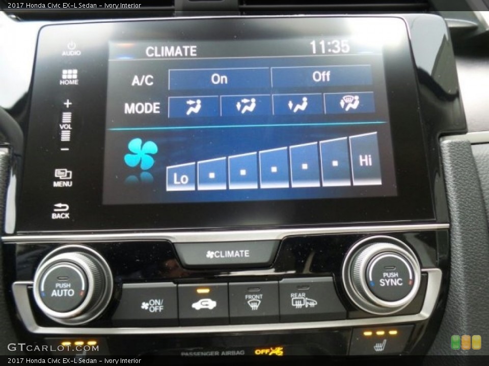 Ivory Interior Controls for the 2017 Honda Civic EX-L Sedan #118625687