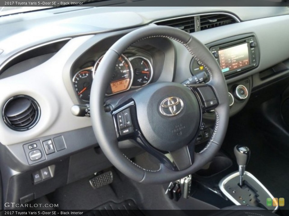 Black Interior Dashboard for the 2017 Toyota Yaris 5-Door SE #118646021