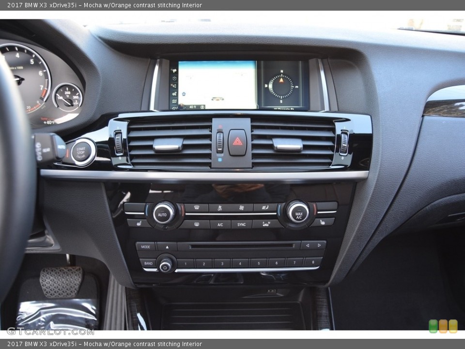 Mocha w/Orange contrast stitching Interior Controls for the 2017 BMW X3 xDrive35i #118713759