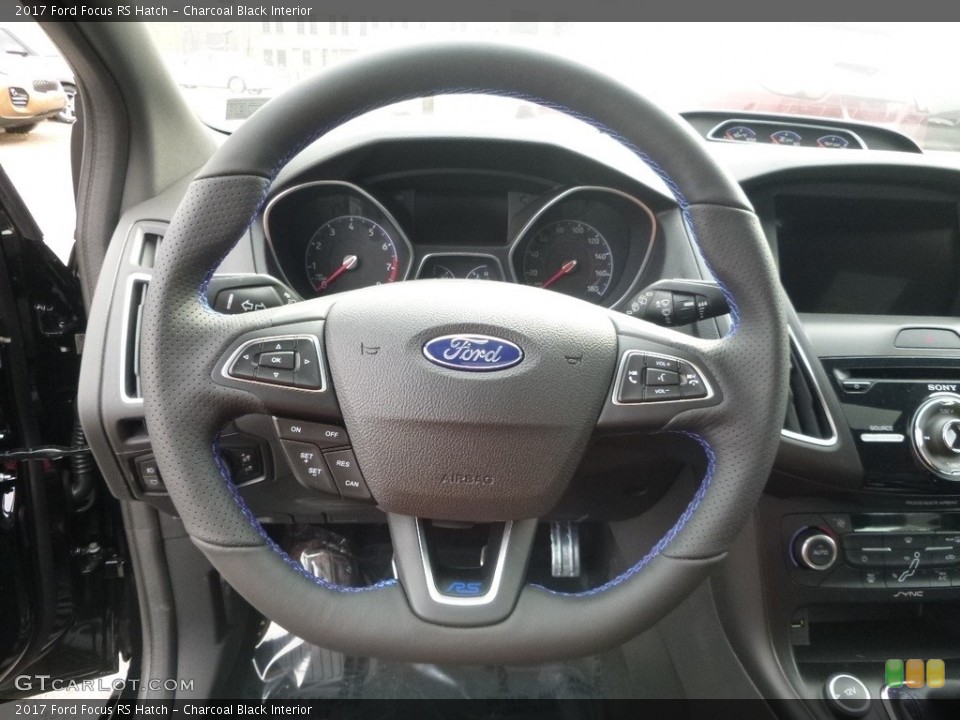 Charcoal Black Interior Steering Wheel for the 2017 Ford Focus RS Hatch #118838587