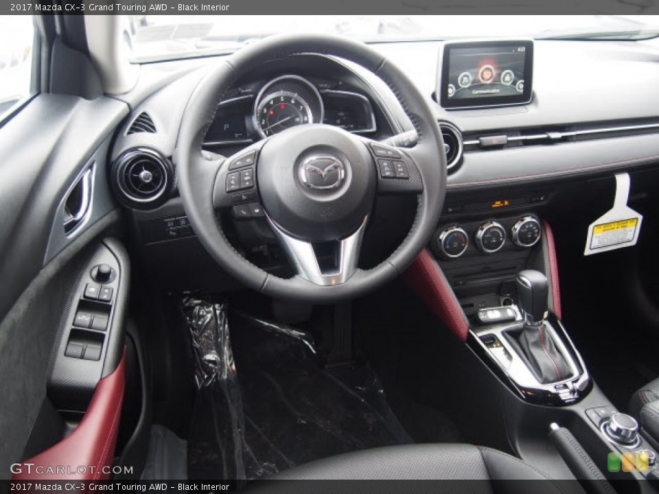 Black Interior Dashboard for the 2017 Mazda CX-3 Grand Touring AWD #118993794