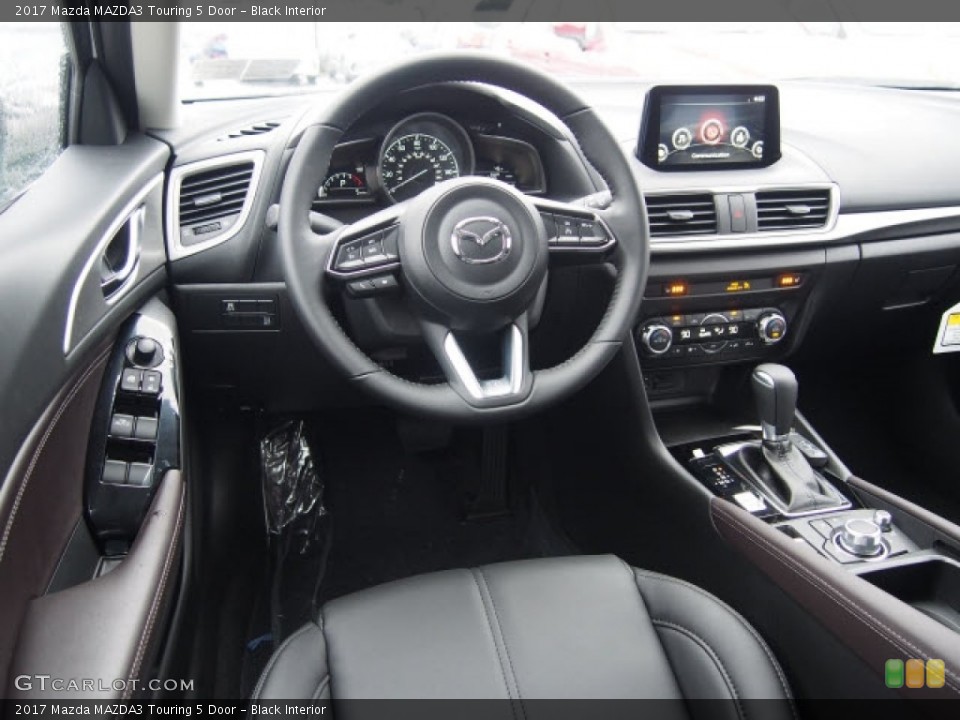 Black Interior Dashboard for the 2017 Mazda MAZDA3 Touring 5 Door #118996287
