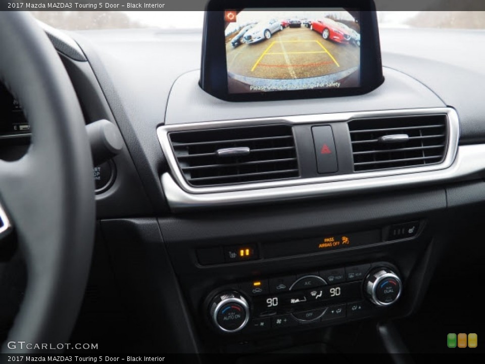 Black Interior Controls for the 2017 Mazda MAZDA3 Touring 5 Door #118997877
