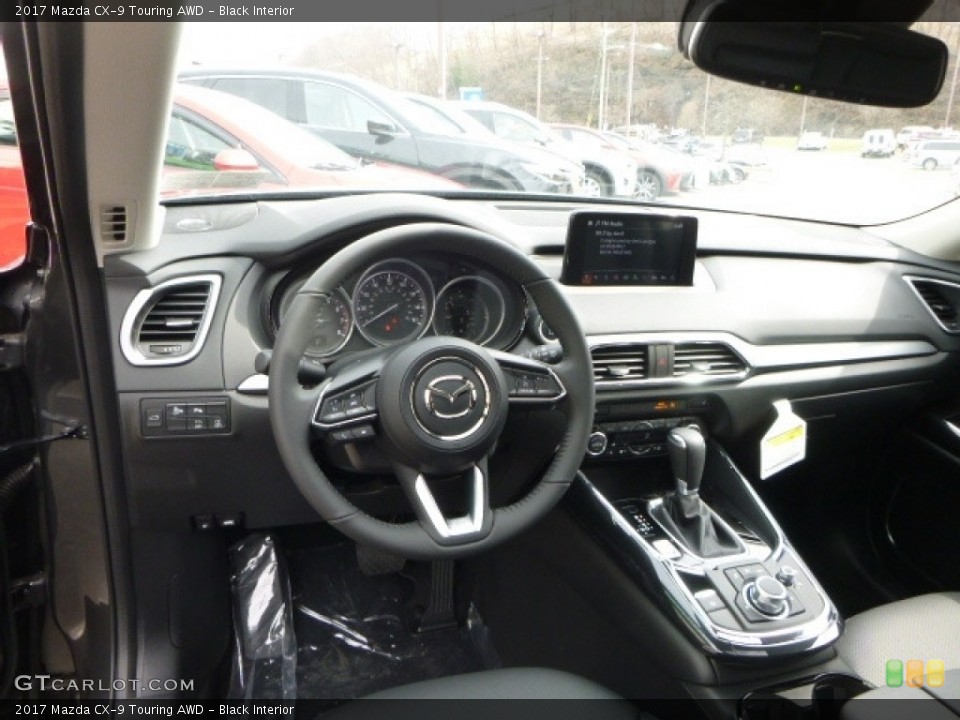 Black Interior Dashboard for the 2017 Mazda CX-9 Touring AWD #119353488
